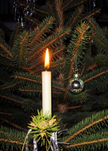 candle with Christmas tree