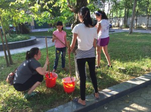 Painting trees at Ha Tinh Orphanage