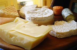 various blocks and rounds of cheeses